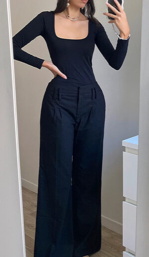 Pantalon tailleur vintage noir, coupe large taille basse pour un look chic